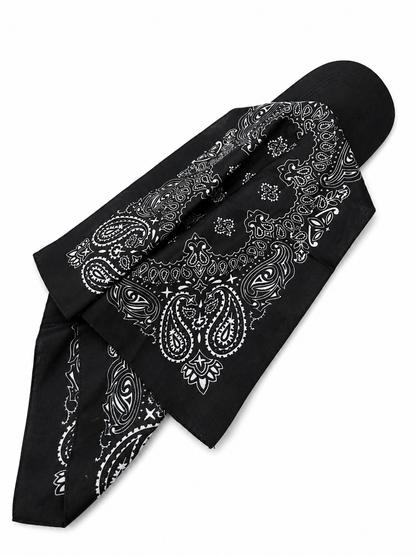 A black bandana scarf with a white paisley pattern, folded and displayed on a clean white background.