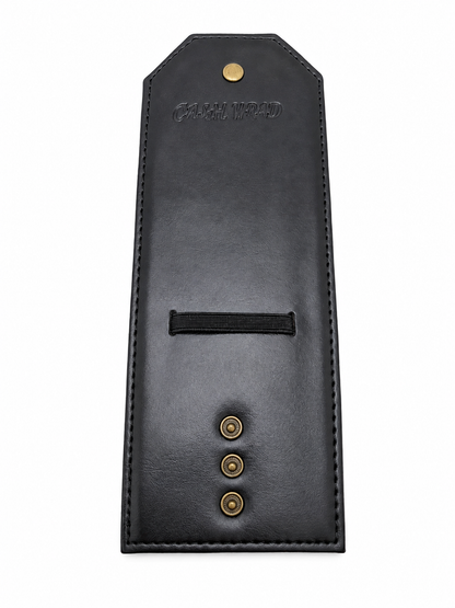 A black leather gun case or holster shown from the back, featuring a top tab, a horizontal black strap, and three brass snap buttons on a white background.