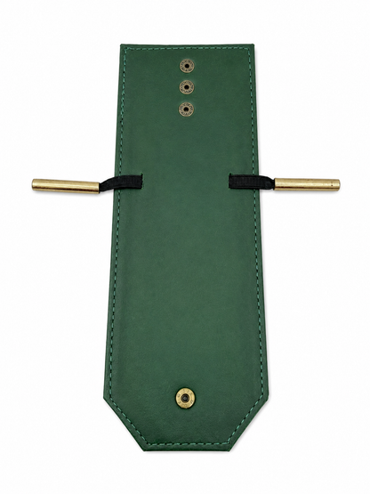 A dark green leather belt buckle cover with brass-toned metal hardware, including two side bars with black elastic loops and three decorative rivets on the front, shown against a plain white background.