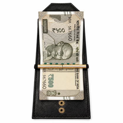 A black leather money clip wallet holding two Indian Rupee banknotes, with a shiny gold metal bar across the front and two gold rivets near the bottom, shown on a plain white background.