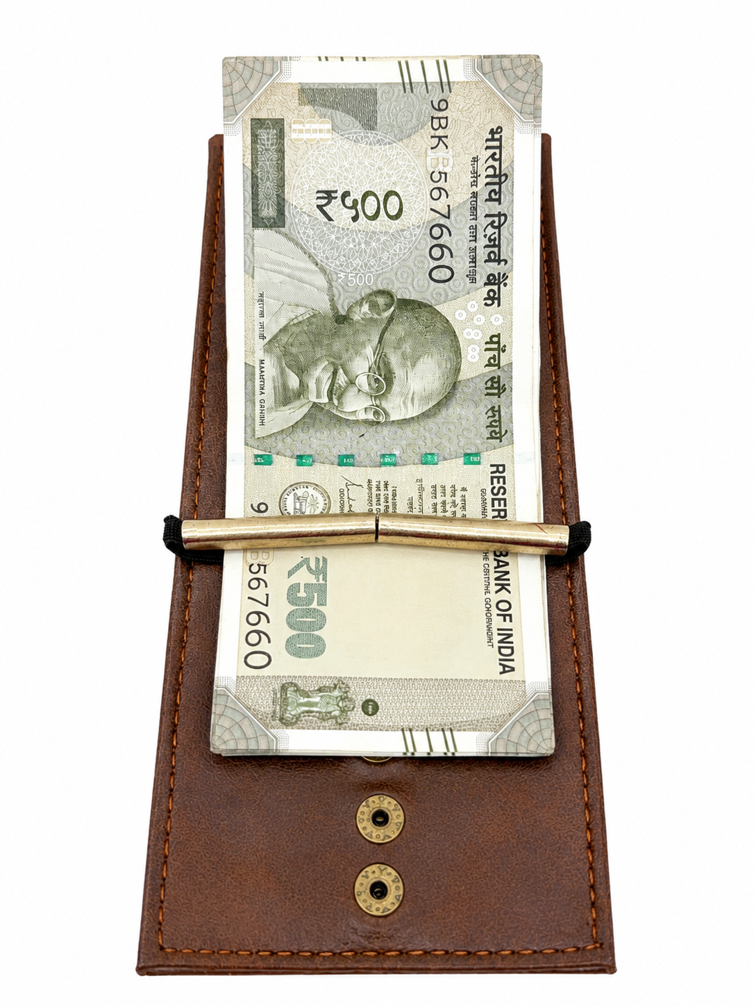 A brown leather money clip holding two Indian Rupee banknotes, with a gold-toned metal bar and black elastic band, shown on a plain white background.