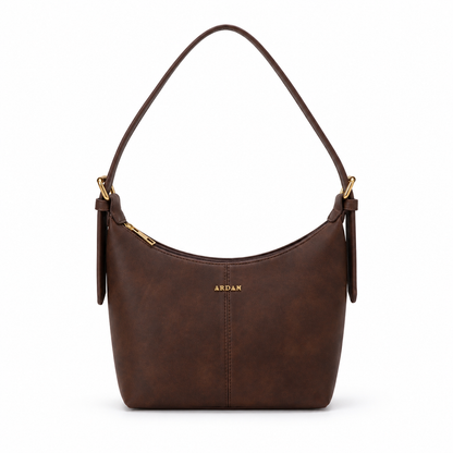 A dark brown faux-leather shoulder bag with gold-tone hardware and a small gold 'ABDAH' logo on the front, shown against a plain white background.