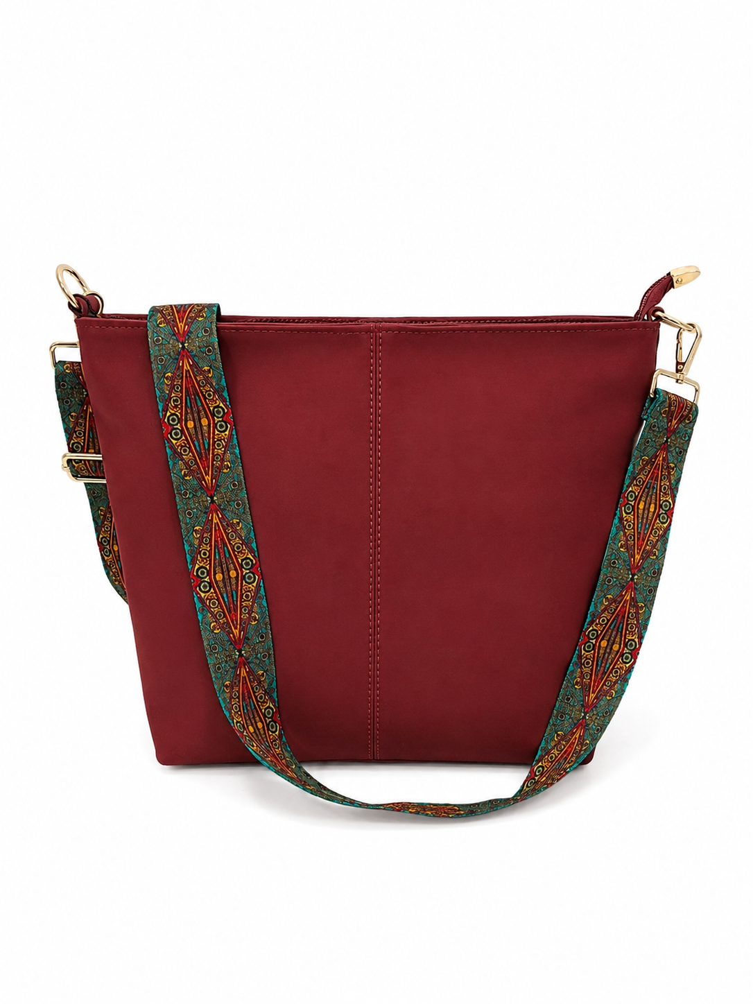 A burgundy tote bag with a wide, patterned green and orange woven shoulder strap, shown against a plain white background.