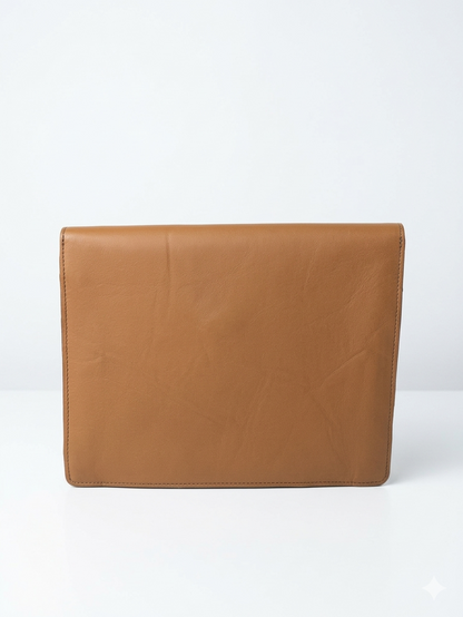 A tan leather clutch or envelope-style handbag shown flat against a plain white studio background.