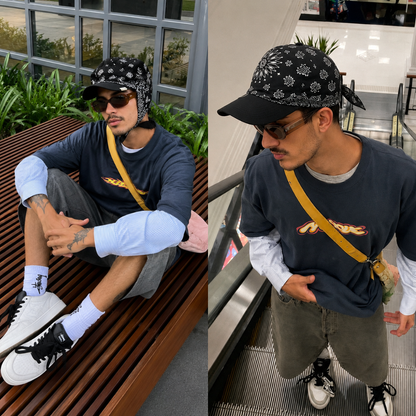 Two images of a person wearing a black cap with white patterns, sunglasses, and casual clothing in an urban setting.